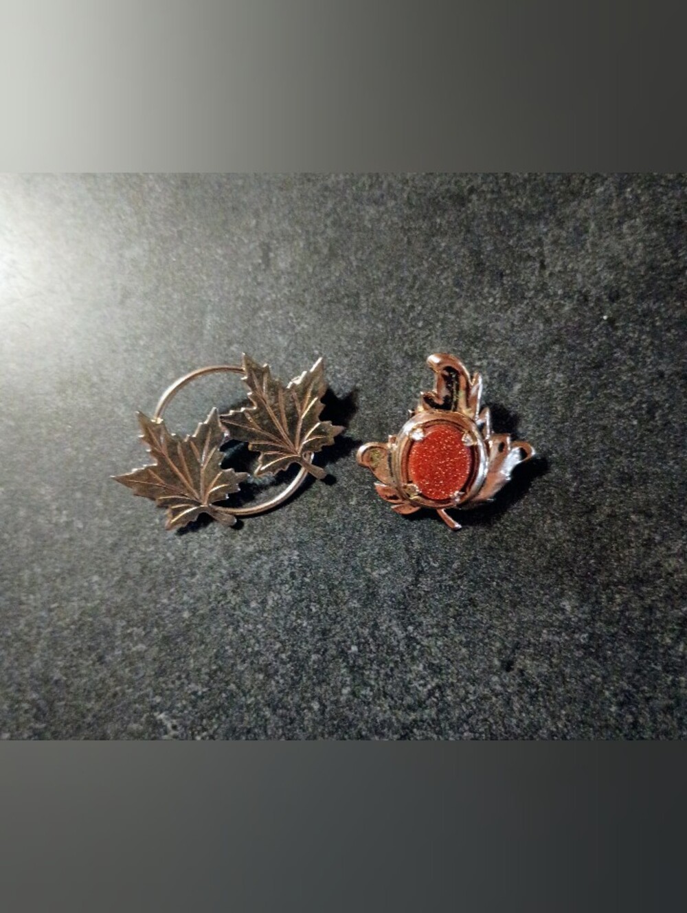 Two Gold Toned Maple Leaf Brooches